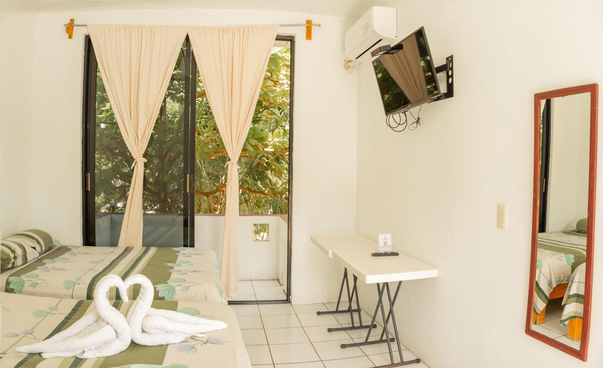 פוארטו אסקונדידו Hotel Palmarito מראה חיצוני תמונה